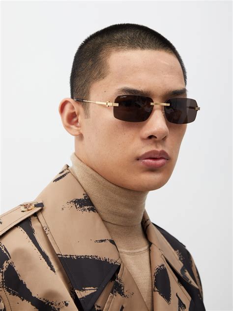 rectangular rimless sunglasses.